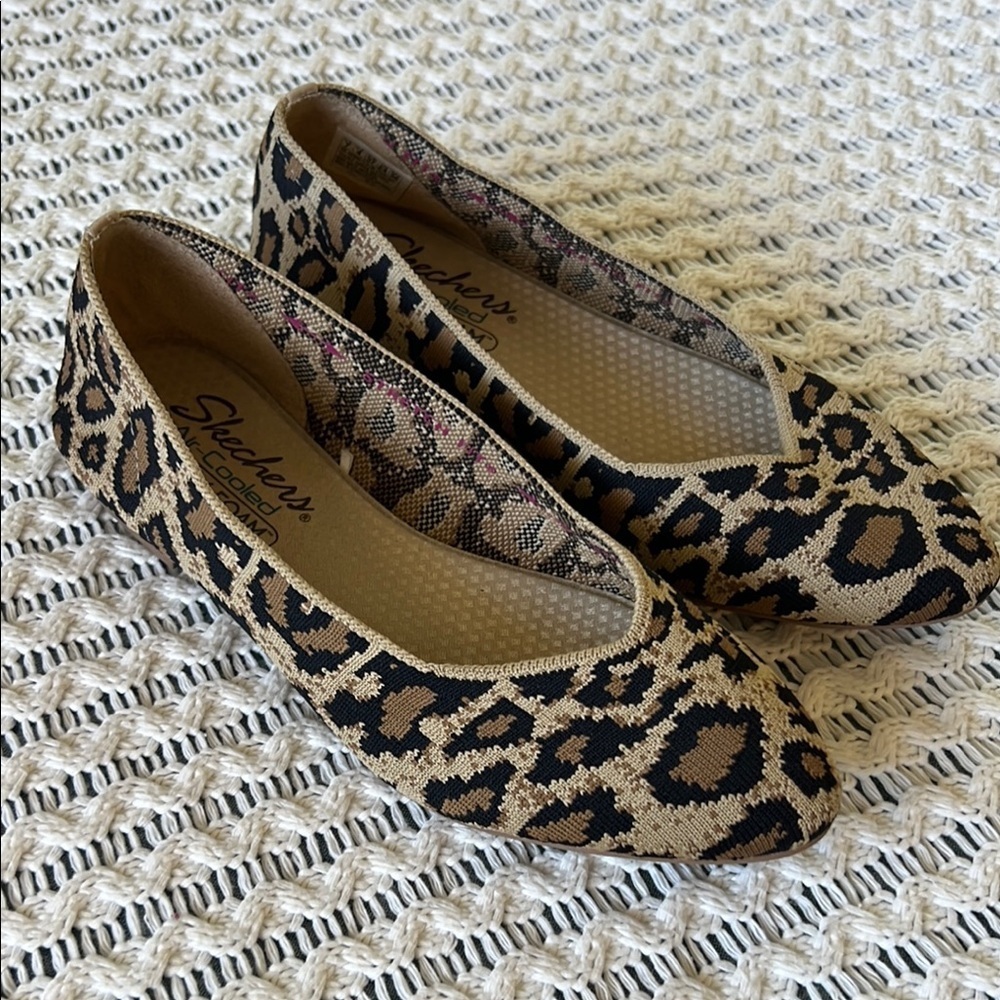 Skechers Leopard Print Slip-On Flats in Black & Tan